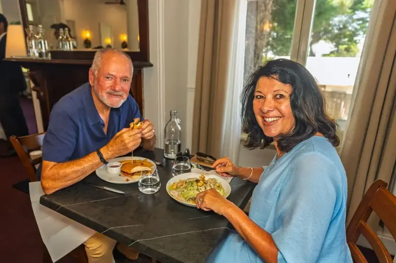 Guests enjoying a restaurant lunch — selected option