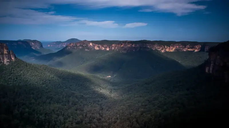 Forested Blue Mountains valley and sandstone escarpments