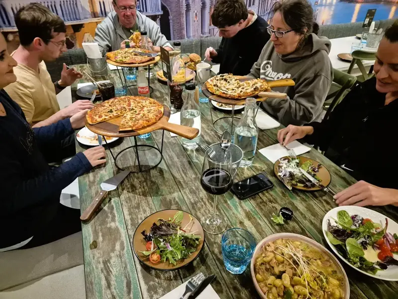 Guests sharing an evening meal