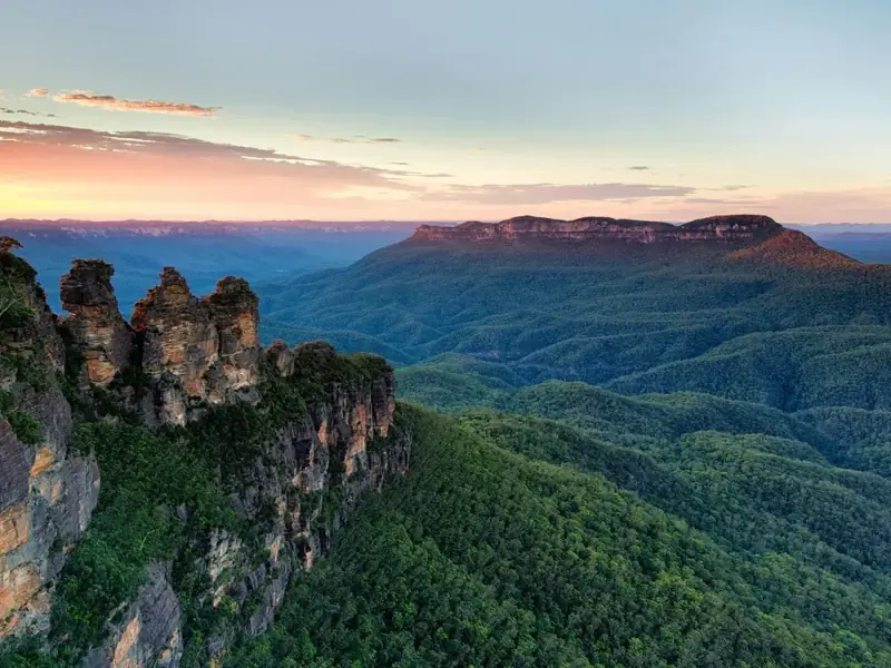 Three Sisters above a forest-filled valley