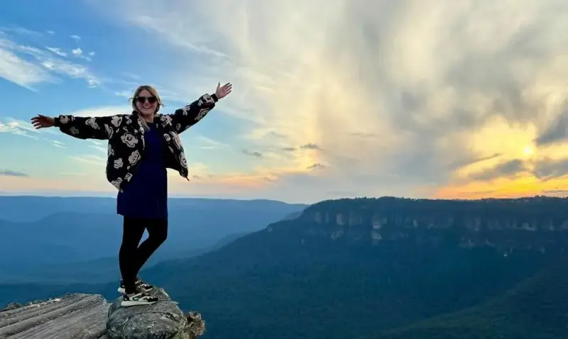 Visitor above a mountain valley